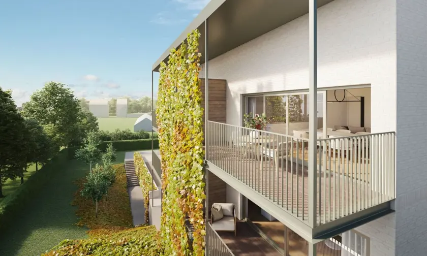 Immeuble d'appartements avec terrasses donnant sur une belle cour intérieure verte